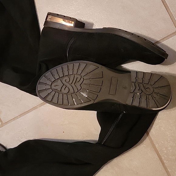 Knee-length boots with gold heel accent, side zipper, and adjustable back laces. - Picture 8 of 14